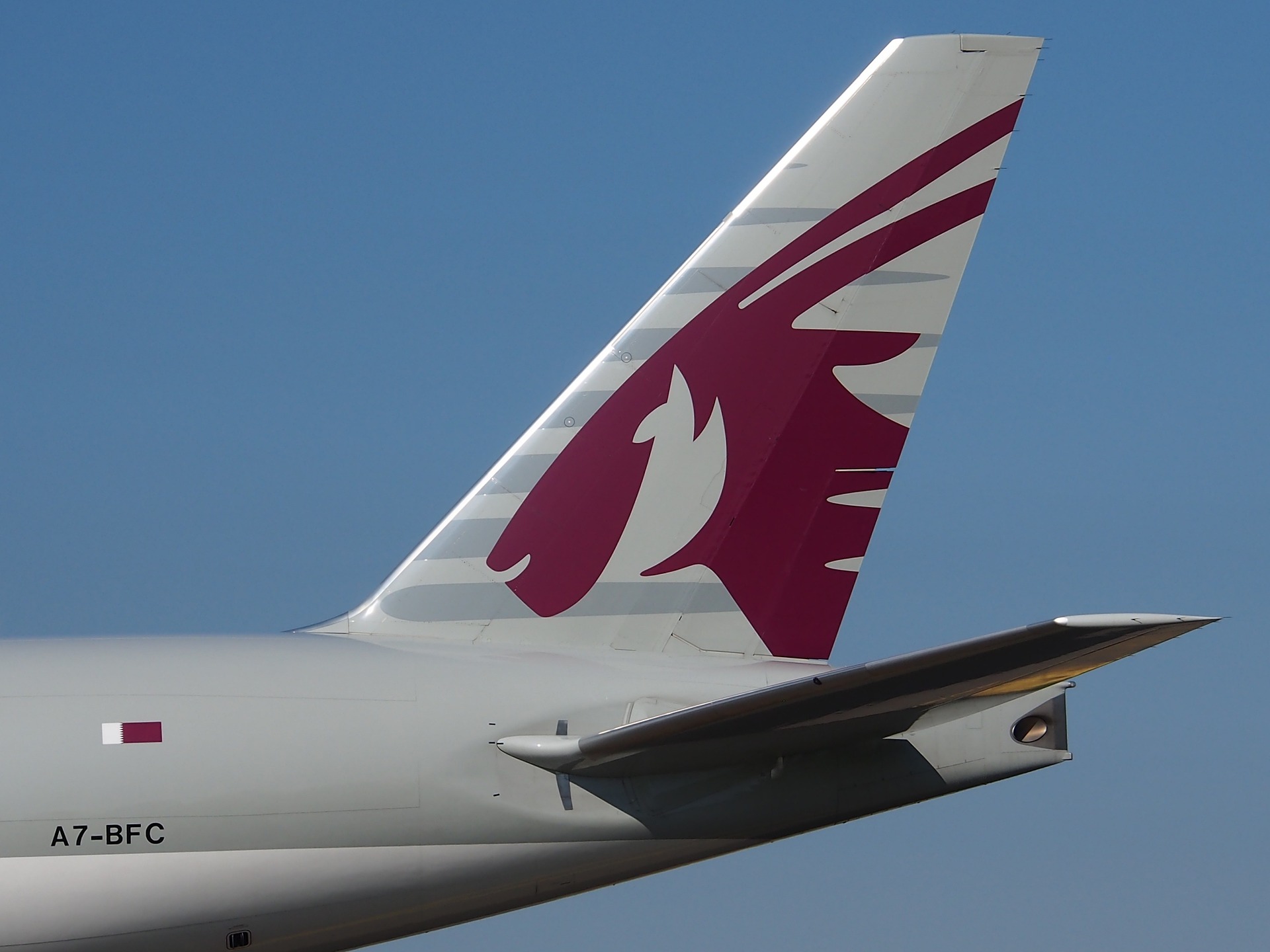 book qatar airways with aa miles